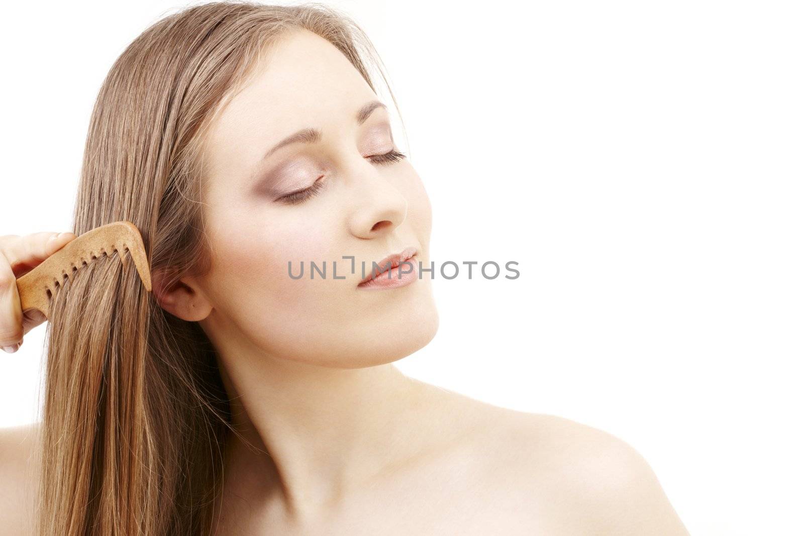 bright picture of combing woman over white