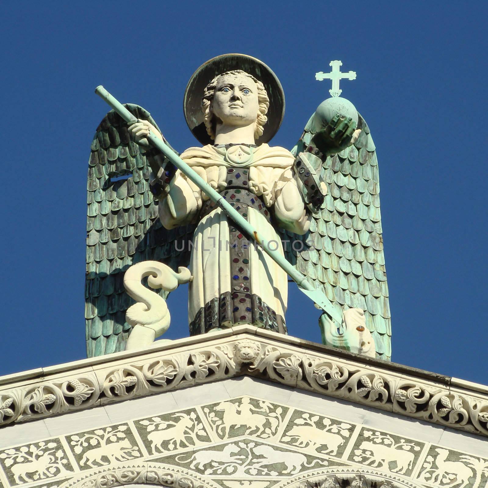 
archangel on top of the curch in Lucca in Tuscany, Italy