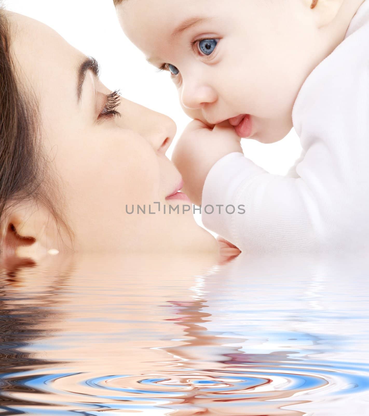 picture of happy mother with baby in water