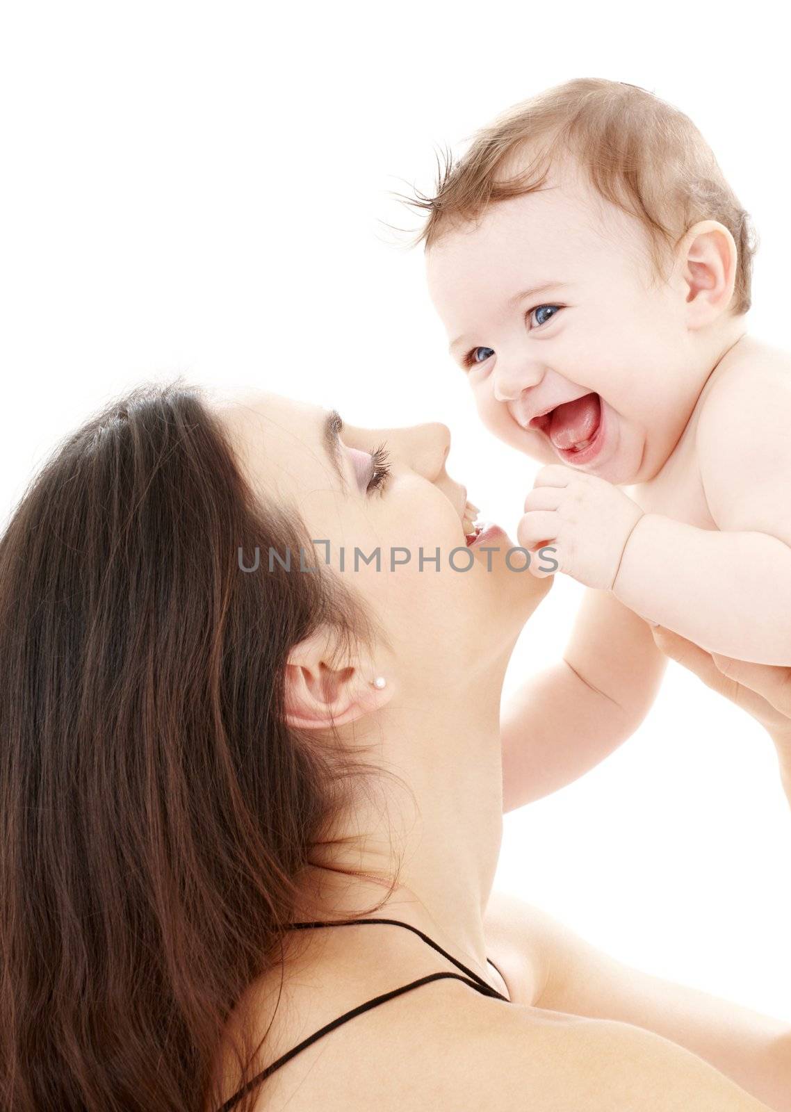 laughing blue-eyed baby playing with mom by dolgachov