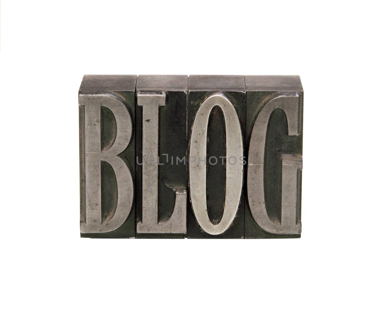 the word 'blog' in letterpress metal type in a condensed font