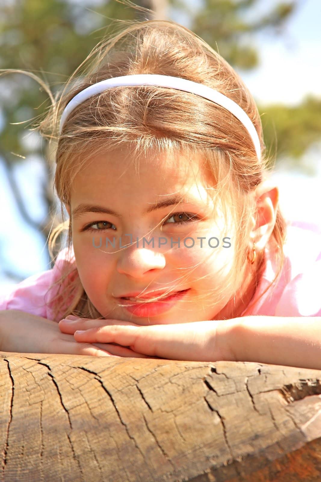 Beautiful, nine years old „pretty lady” on the bench     