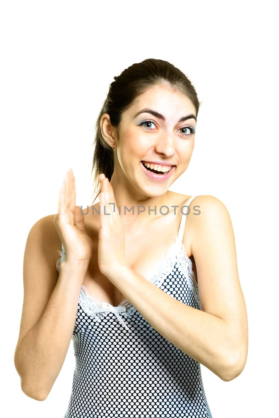 portrait of a happy beautiful girl clapping her hands