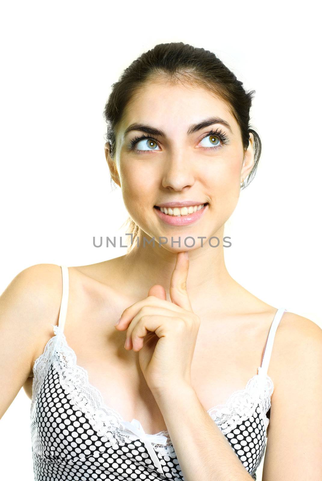 portrait of a beautiful young thoughtful woman against white background