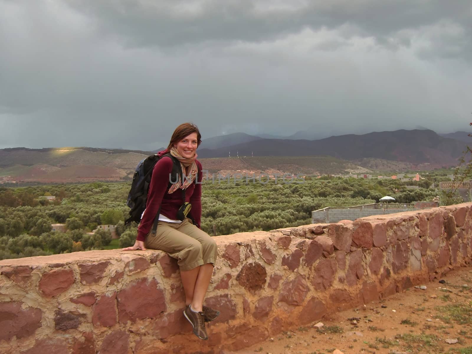 a woman is taking a break in a stormy weather