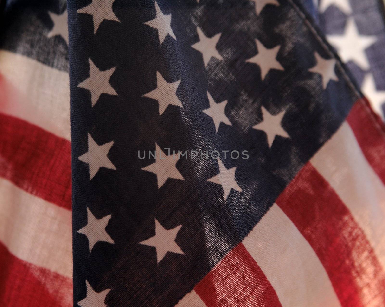 two backlit American flags in a unique view of the stars and stripes