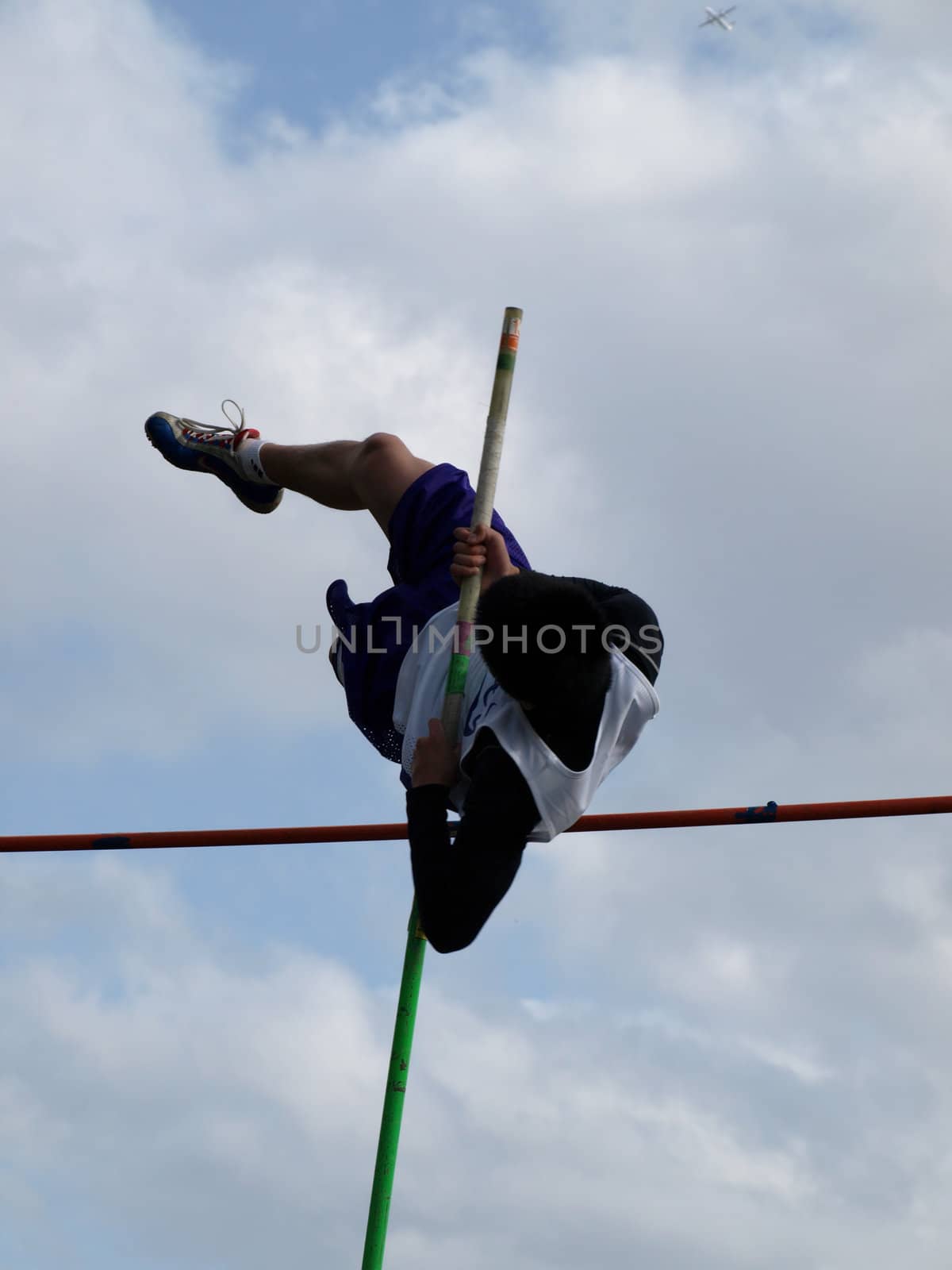 Jumping the Pole by RGebbiePhoto