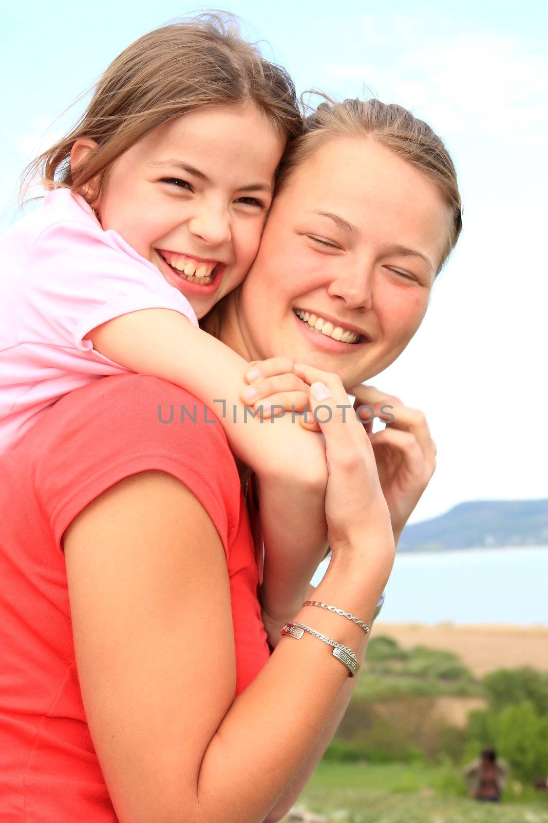 Beautiful, young sisters enjoy life in front of the camera      