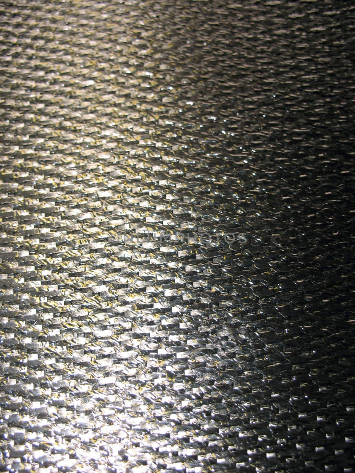 Real carbon fiber in its raw form - this is the material that is used to make durable and strong parts for cars, boats, bikes, and even photography equipment. 