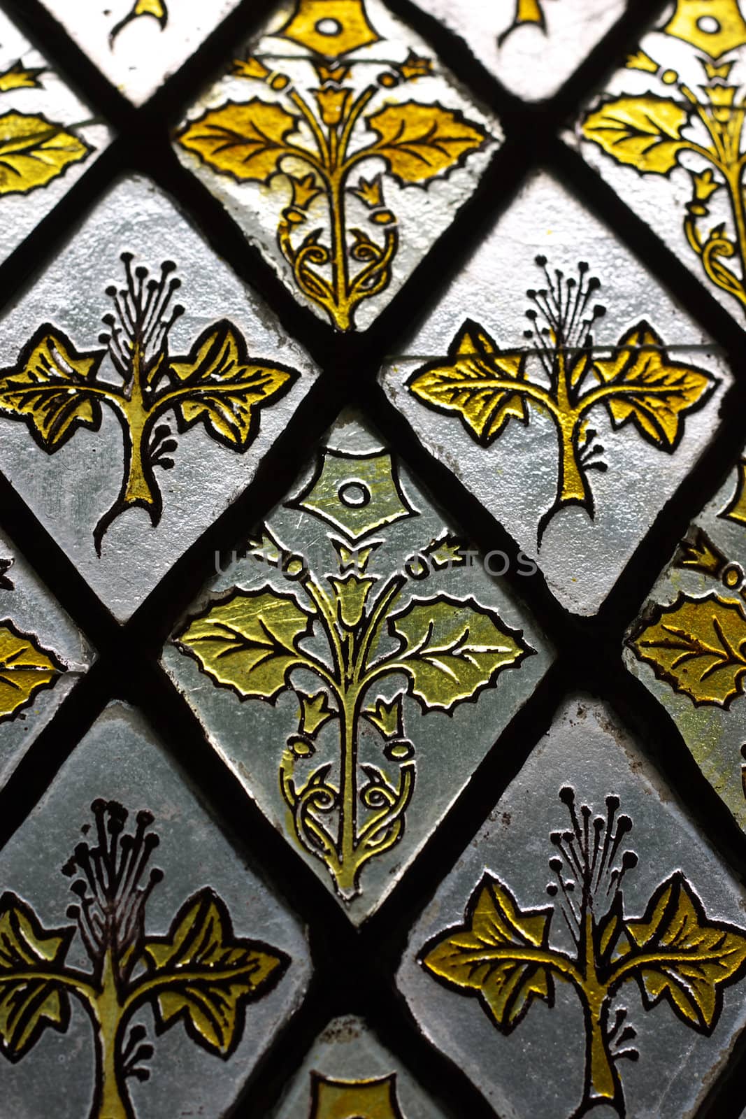Detail of a stained glass window, kind of frosted, rough glass