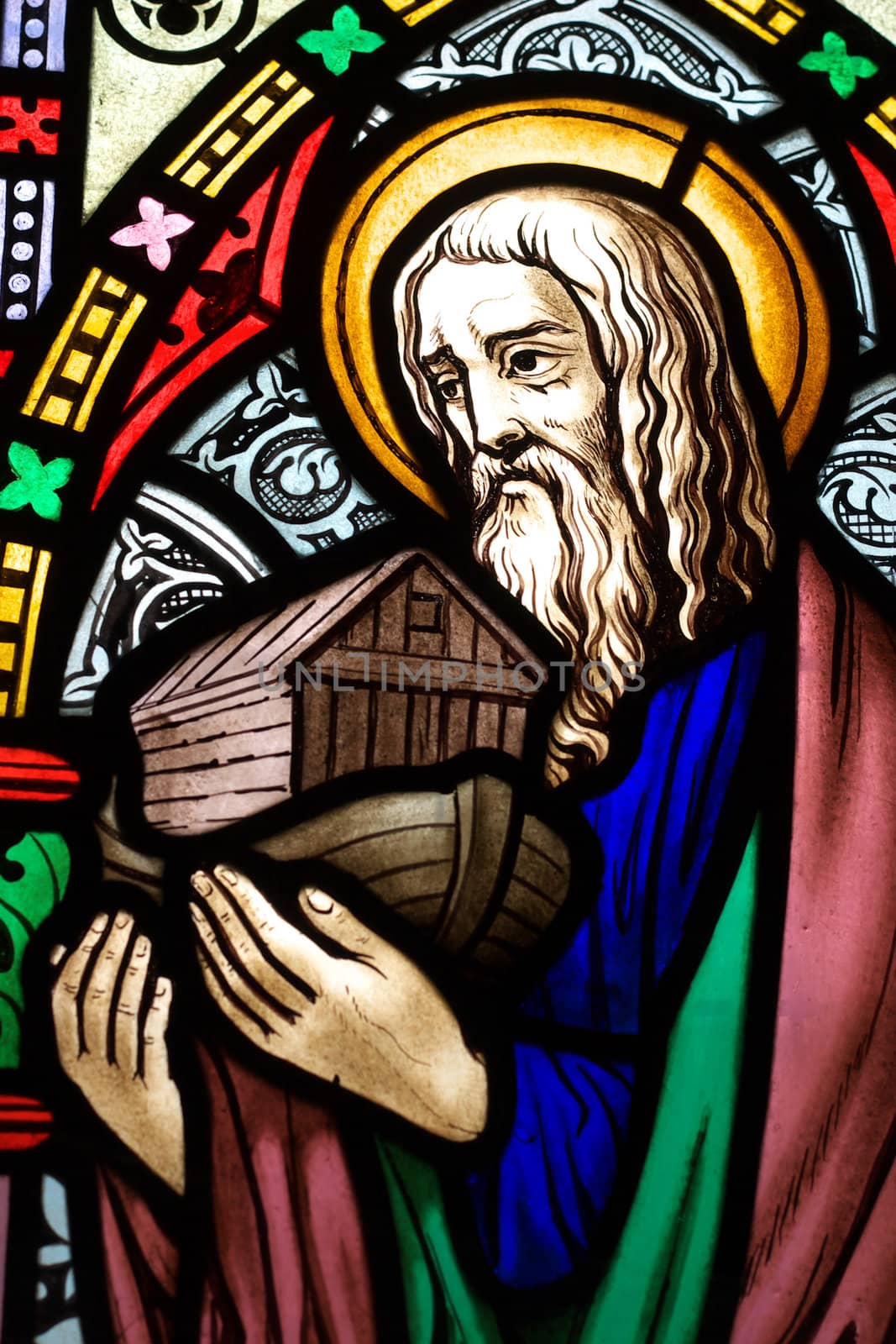 detail of victorian stained glass church window in Fringford depicting Noah with the ark in his arms