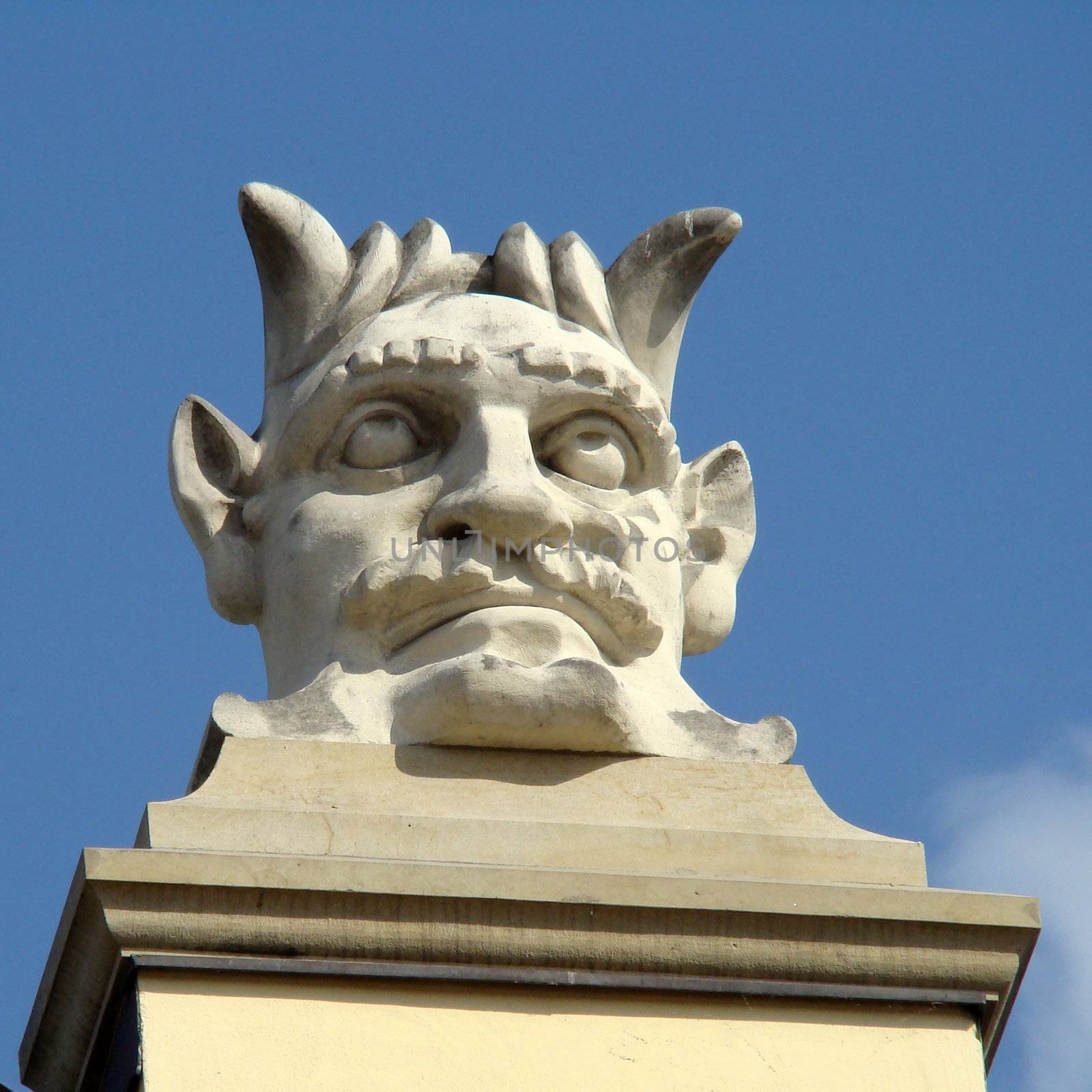 mascaron on Cloth Hall in Main Market Square in Cracow, Poland
