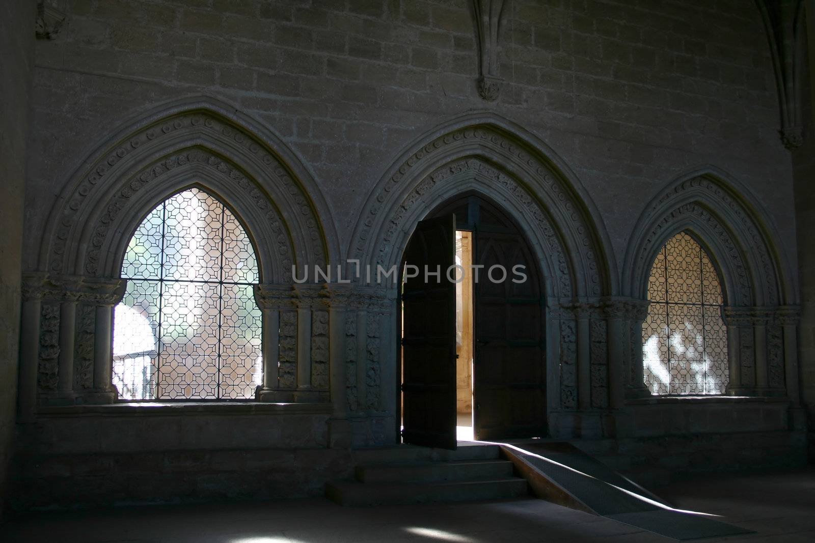 door and windows in a european monastery, possible concepts: enclosed, freedom