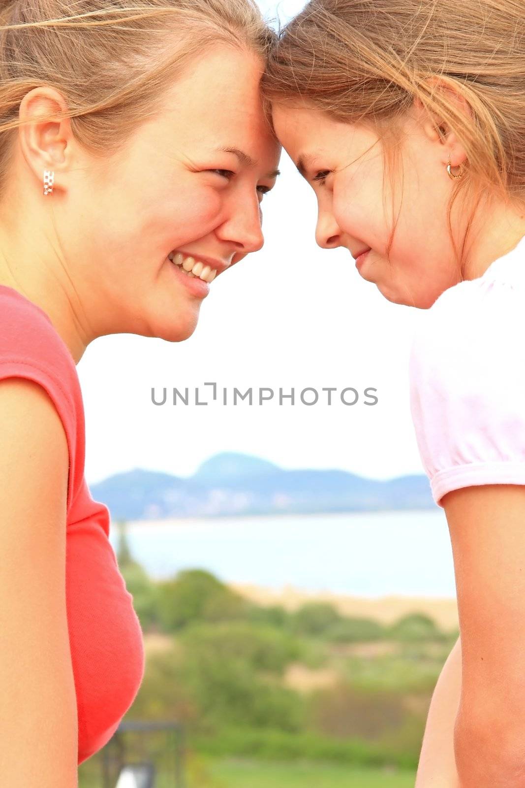 Beautiful, young sisters enjoy life in front of the camera 