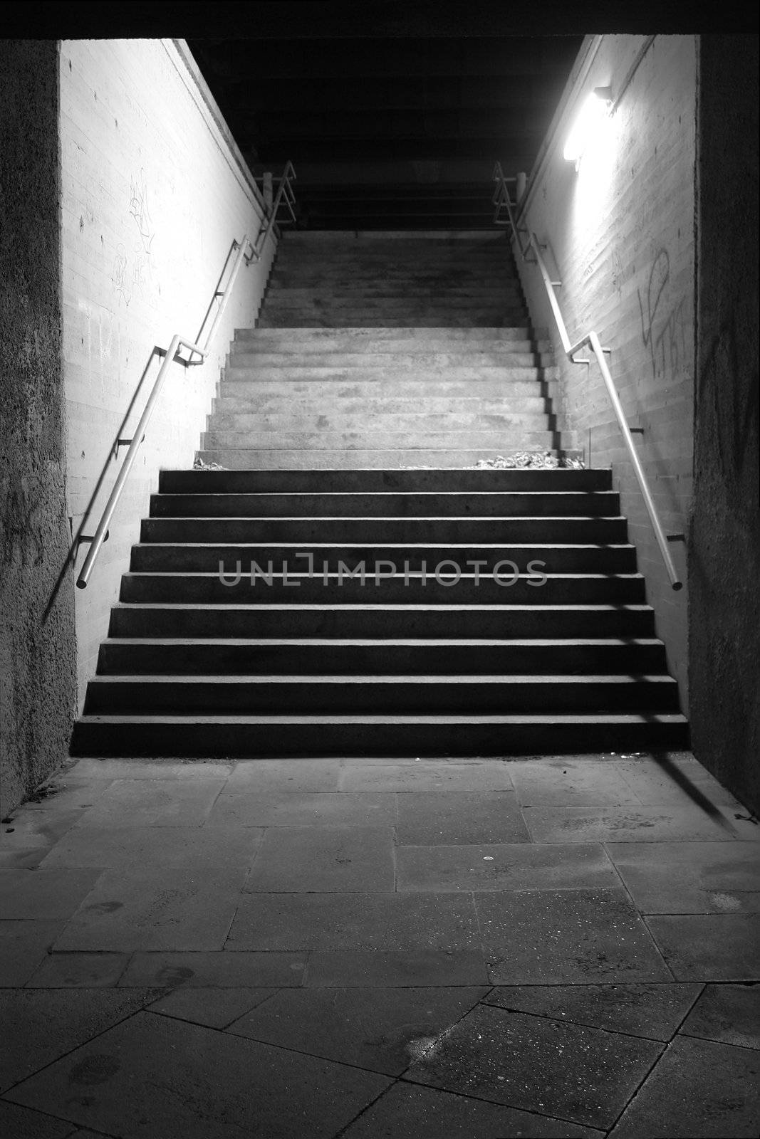 Way out from under the bridge. Concept shot: urban loneliness, fear, crime... homelessness....