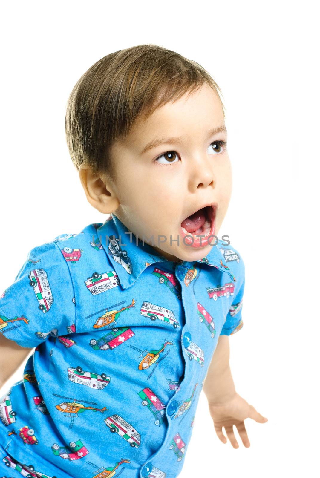 portrait of a displeased screaming three year old boy 