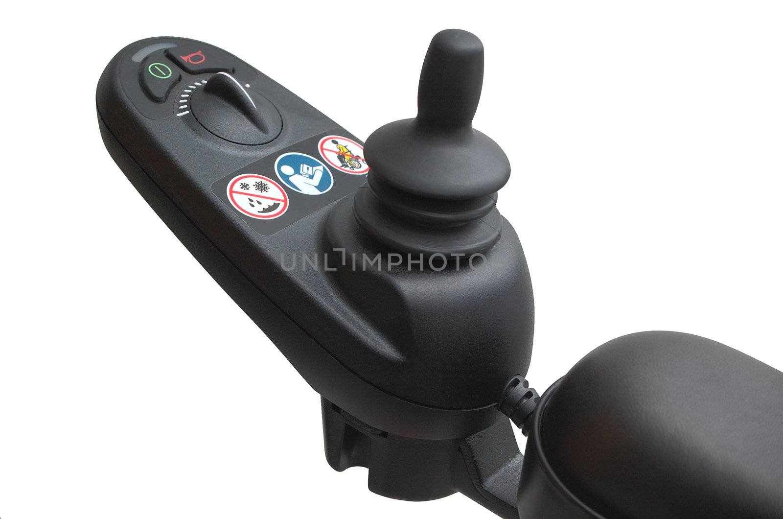 Close-up of the joystick type controller of an electrically powered wheelchair, with speed control knob and buttons for power and a warning horn.