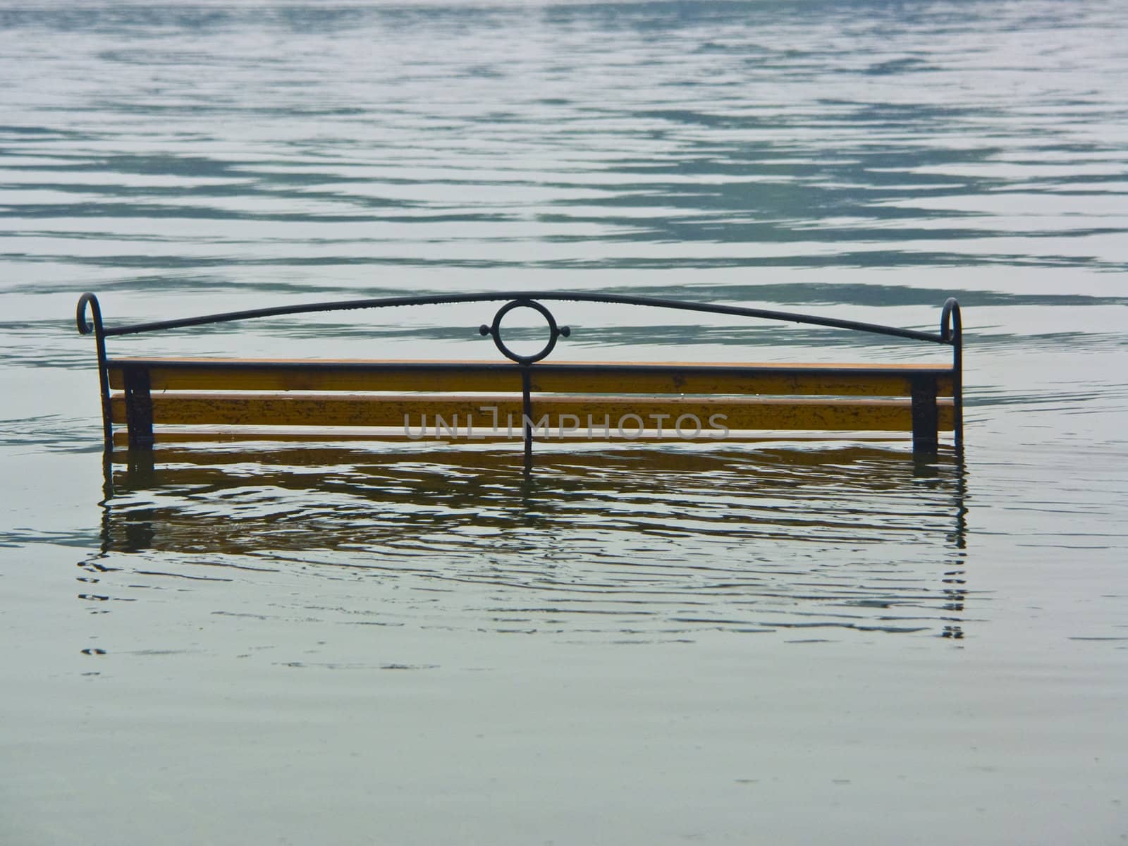  The image of the bench flooded by water.