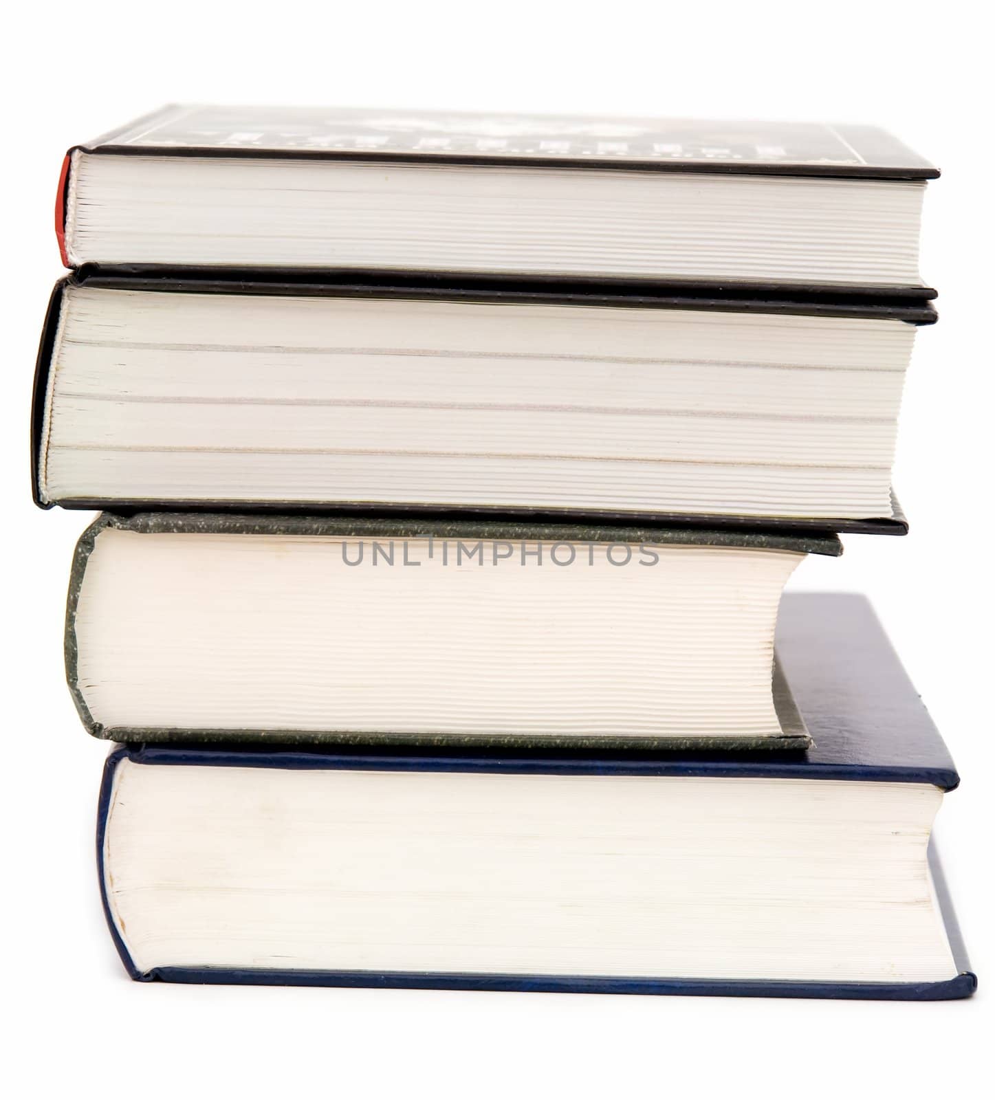 Some thick books on a white background
