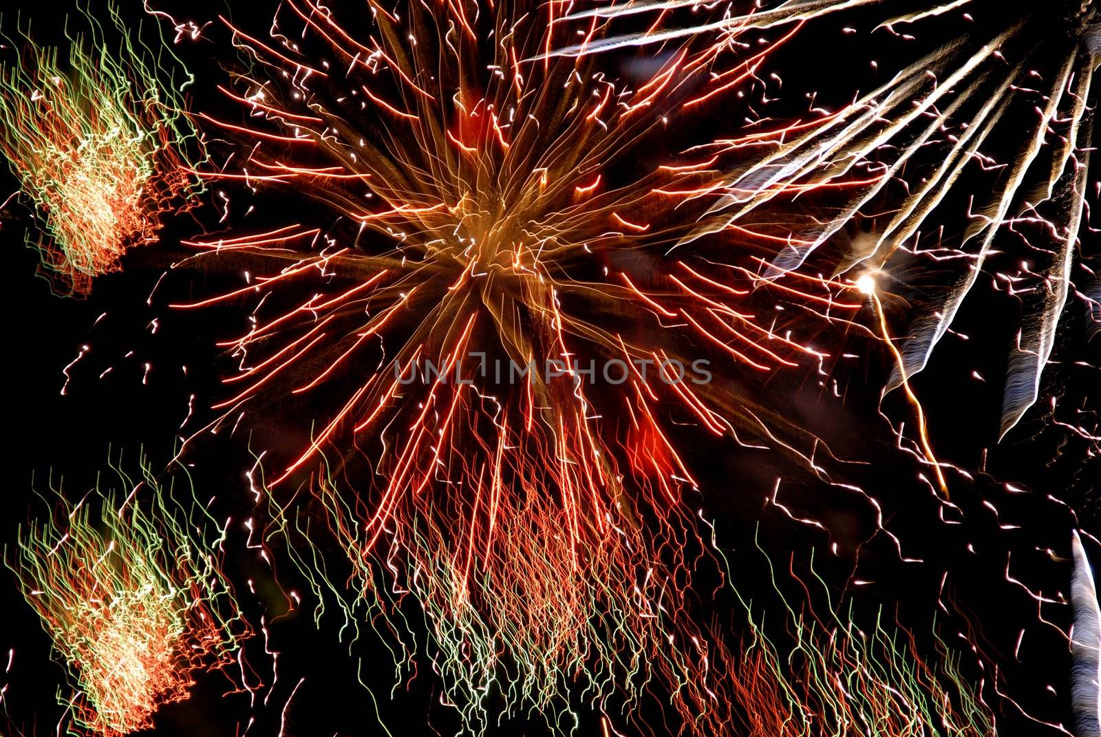 abstract colored fireworks in the dark night