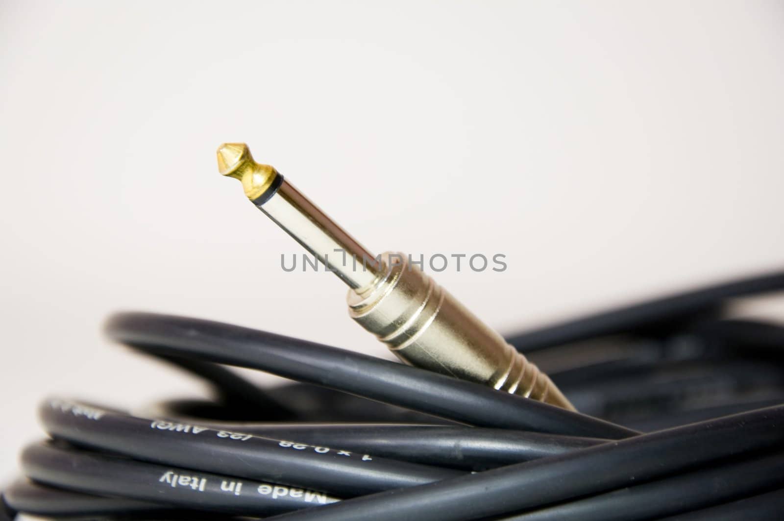 detail of a guitar cable with jack