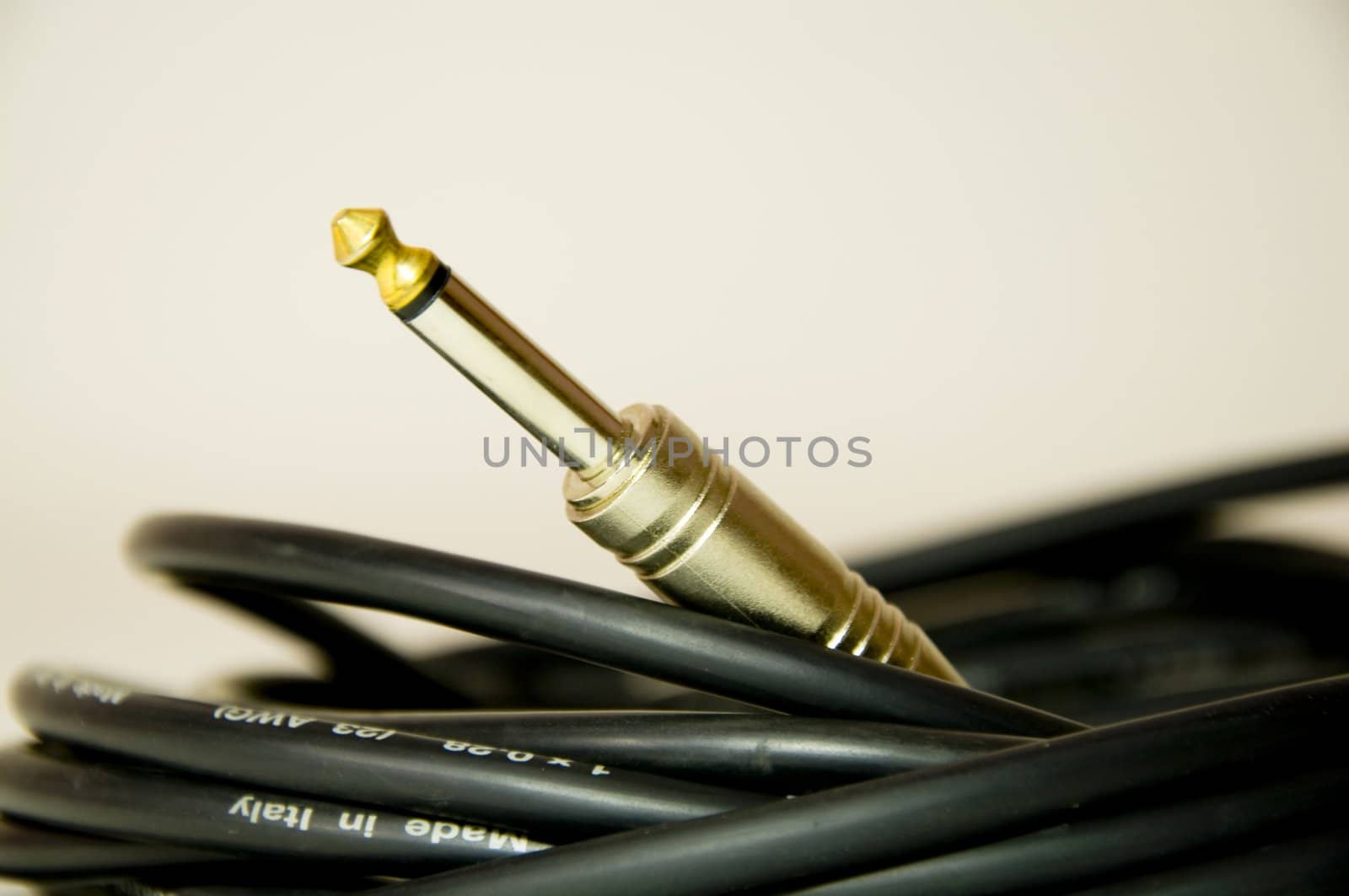 detail of a guitar cable with jack