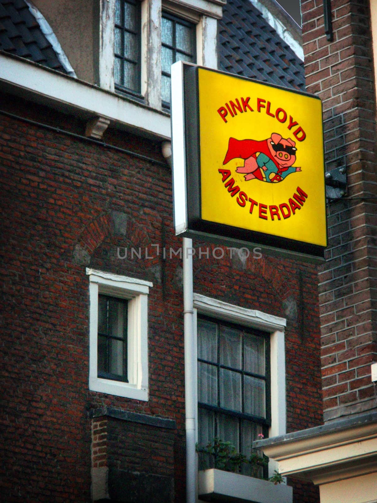 Image of "Pink Floyd Amsterdam" coffee shop and surrounding buildings in Amsterdam, Netherlands.