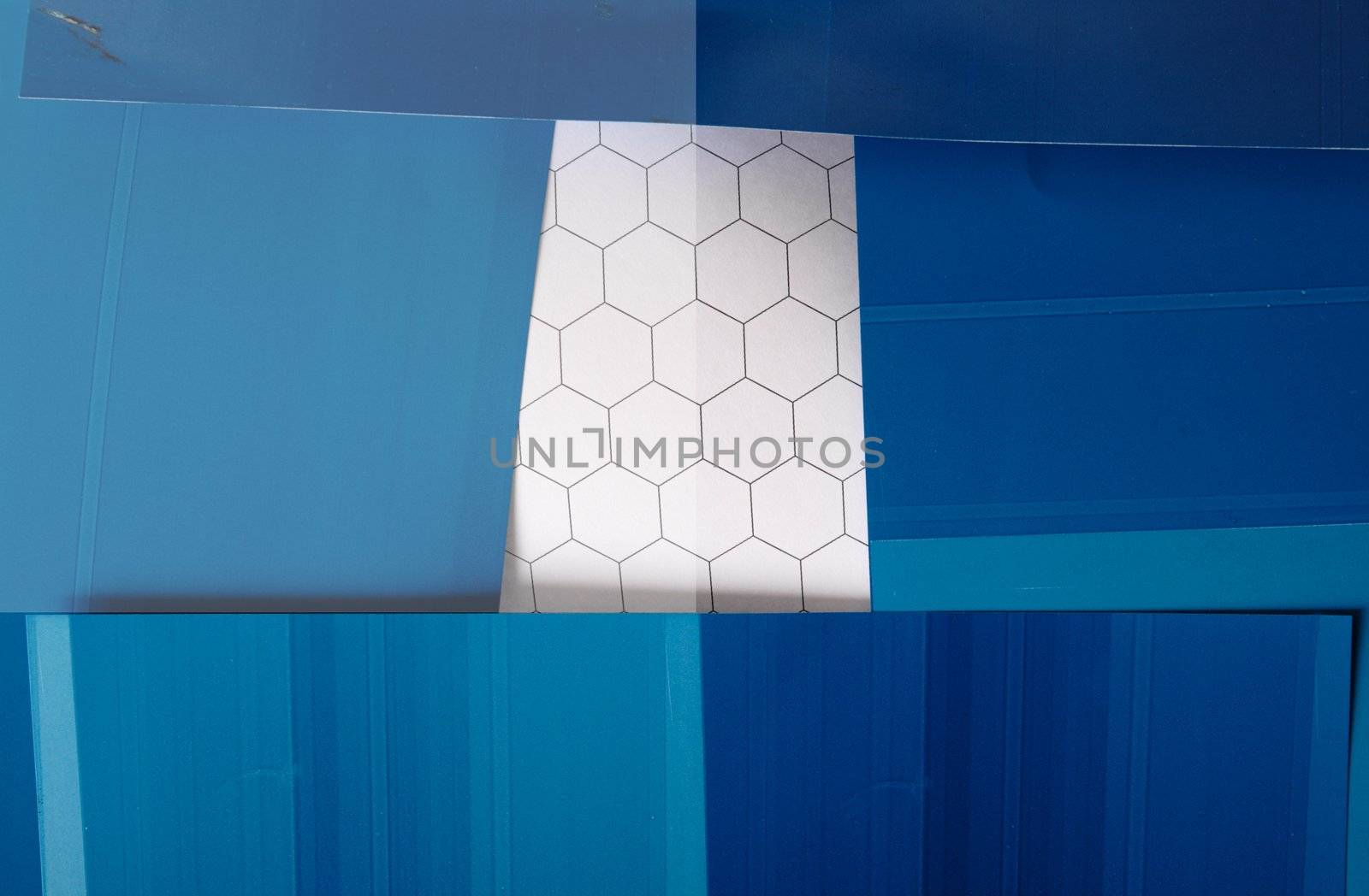 hexagon graph paper bordered by blue ink blotting paper