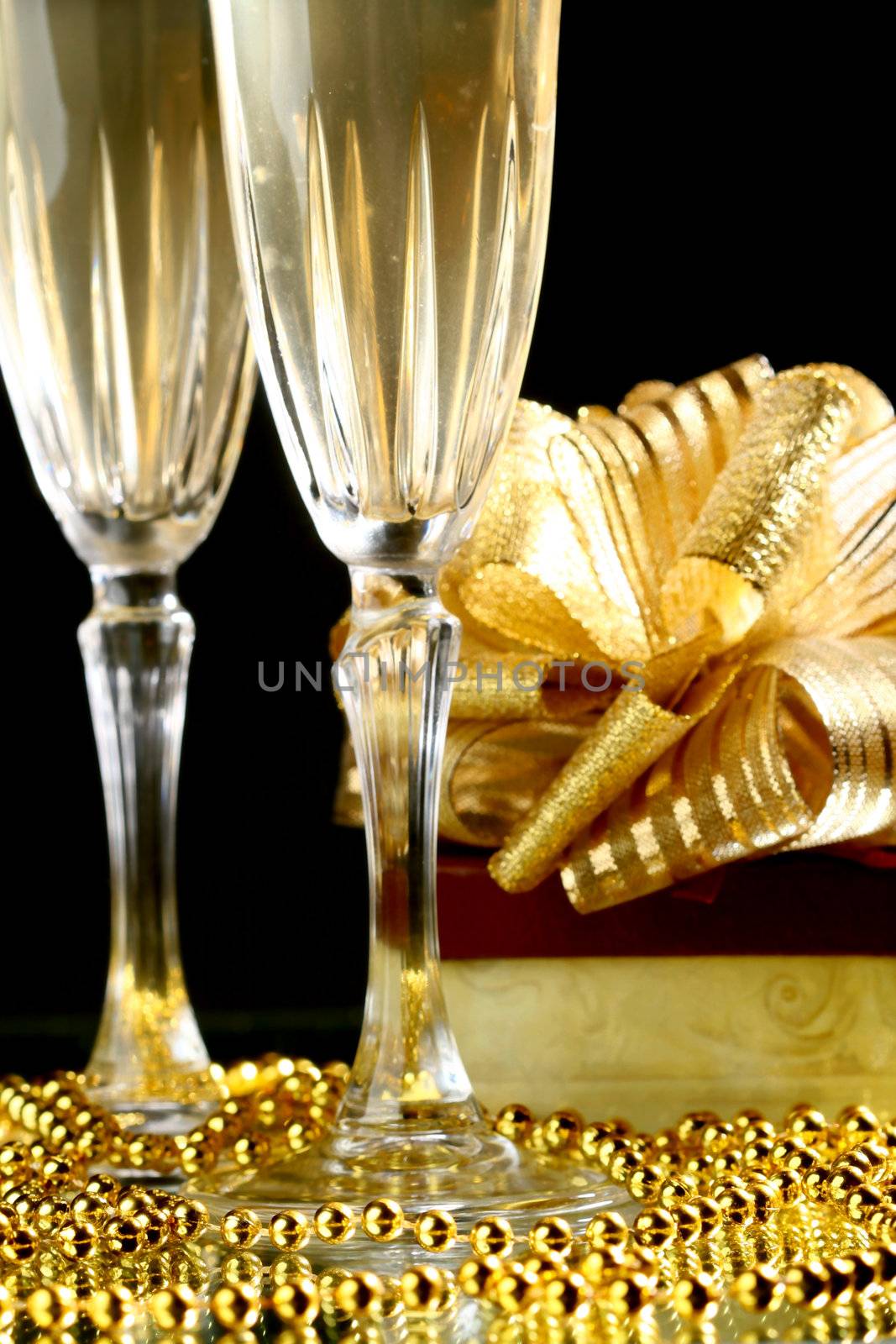 holiday card golden champagne and gift