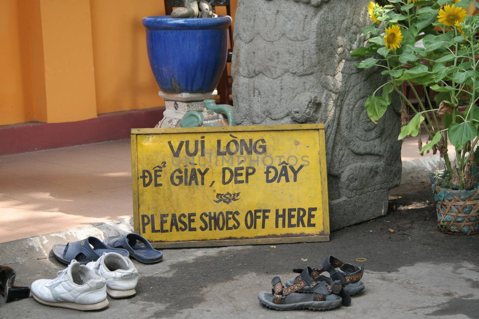 Temple entrance in Vietnam where the shoes have to be taken off before entering the temple