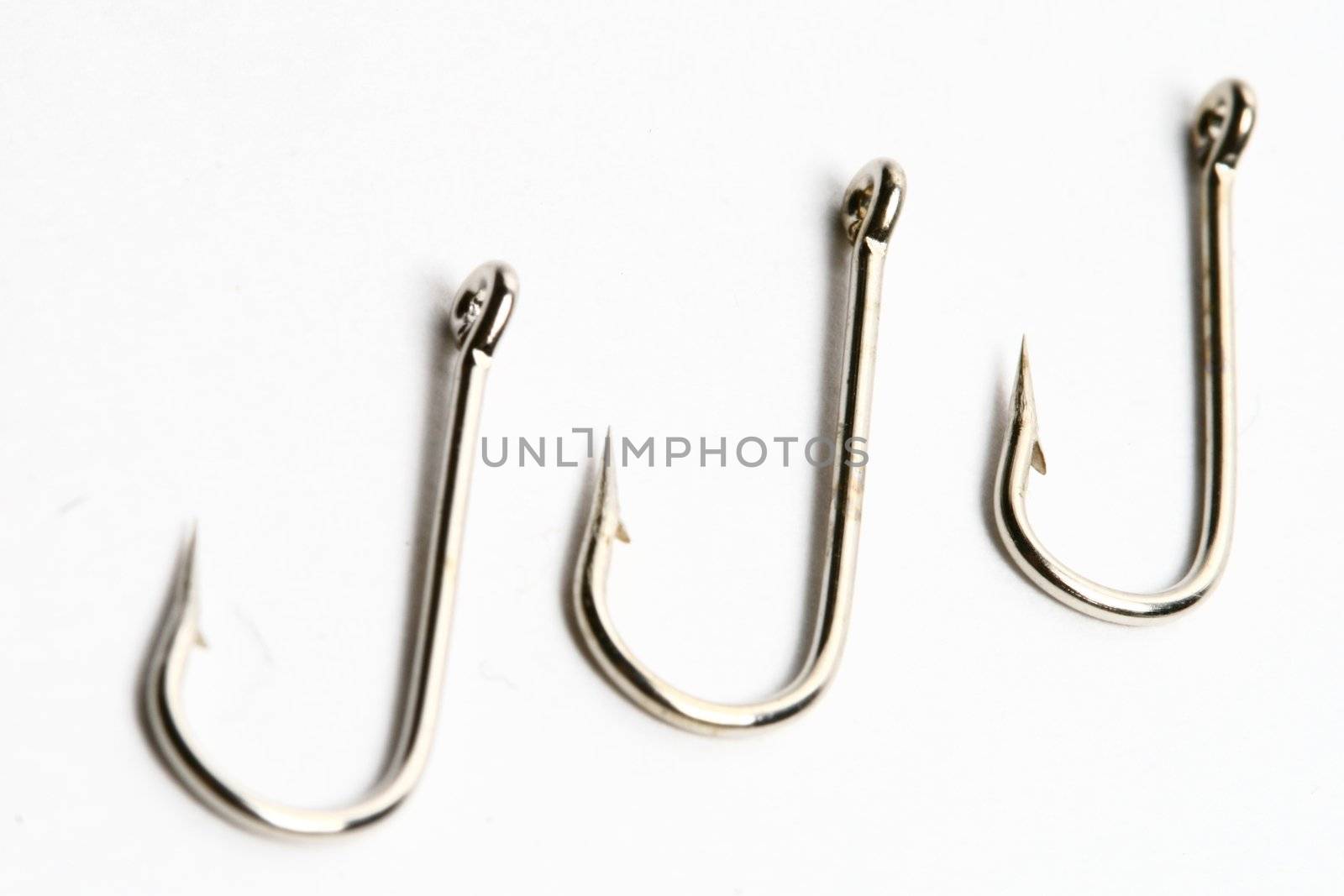 fishing hooks macro close up on white