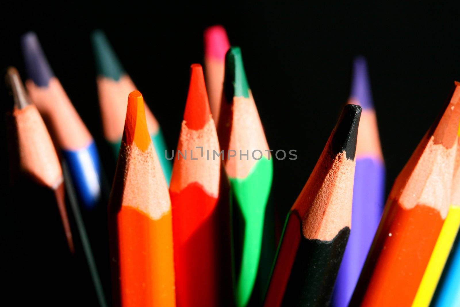 colour pencils on black macro close up