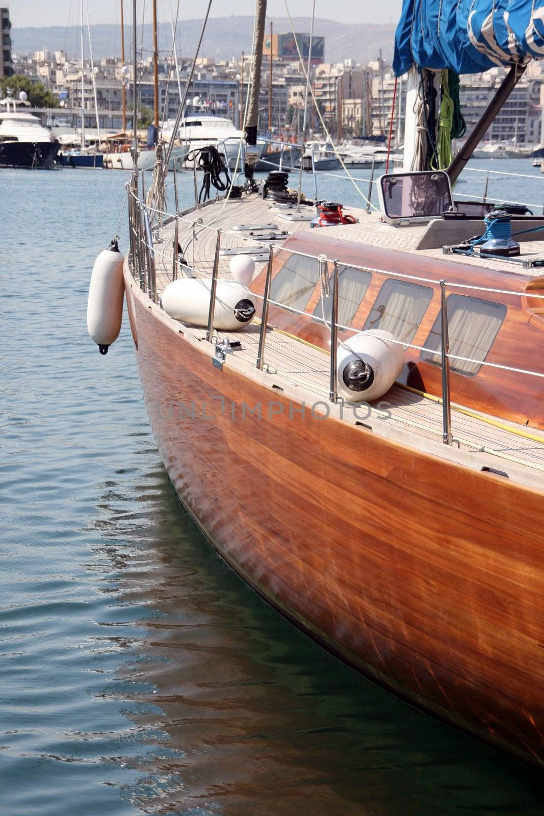 luxury sail yacht at marina and city view background