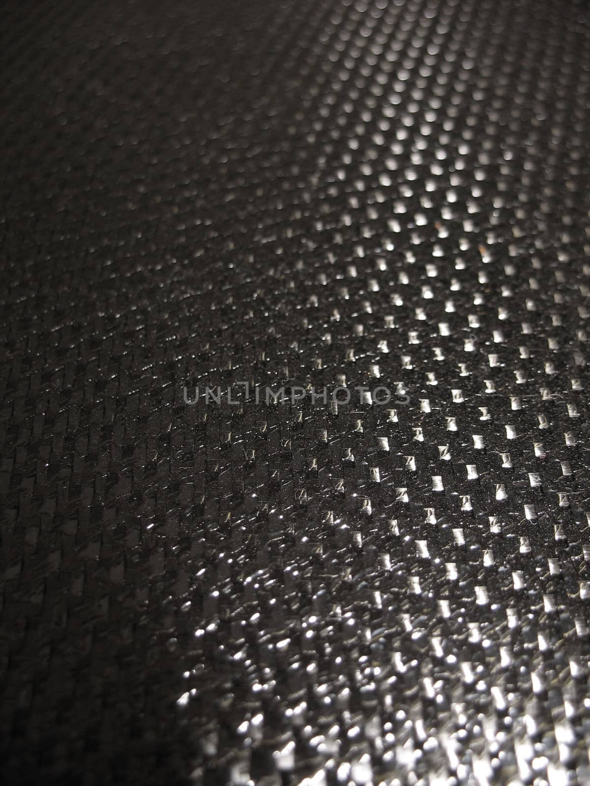 Real carbon fiber in its raw form - this is the material that is used to make durable and strong parts for cars, boats, bikes, and even photography equipment. 