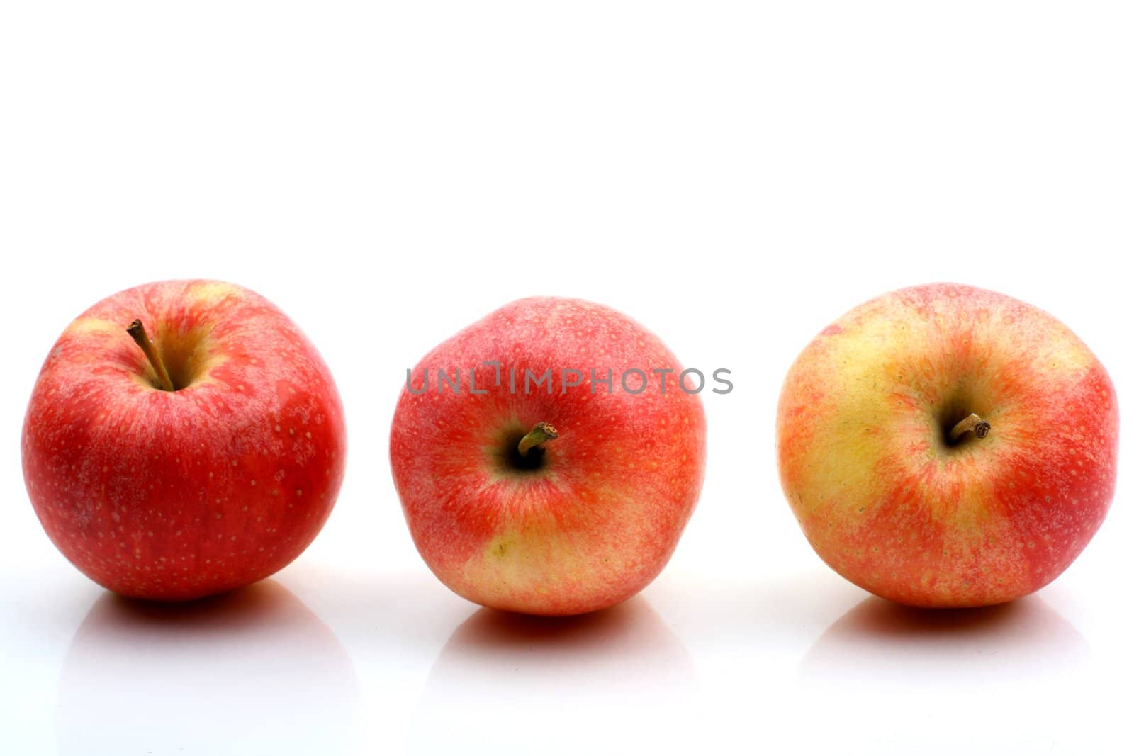 three apple isolated on white background