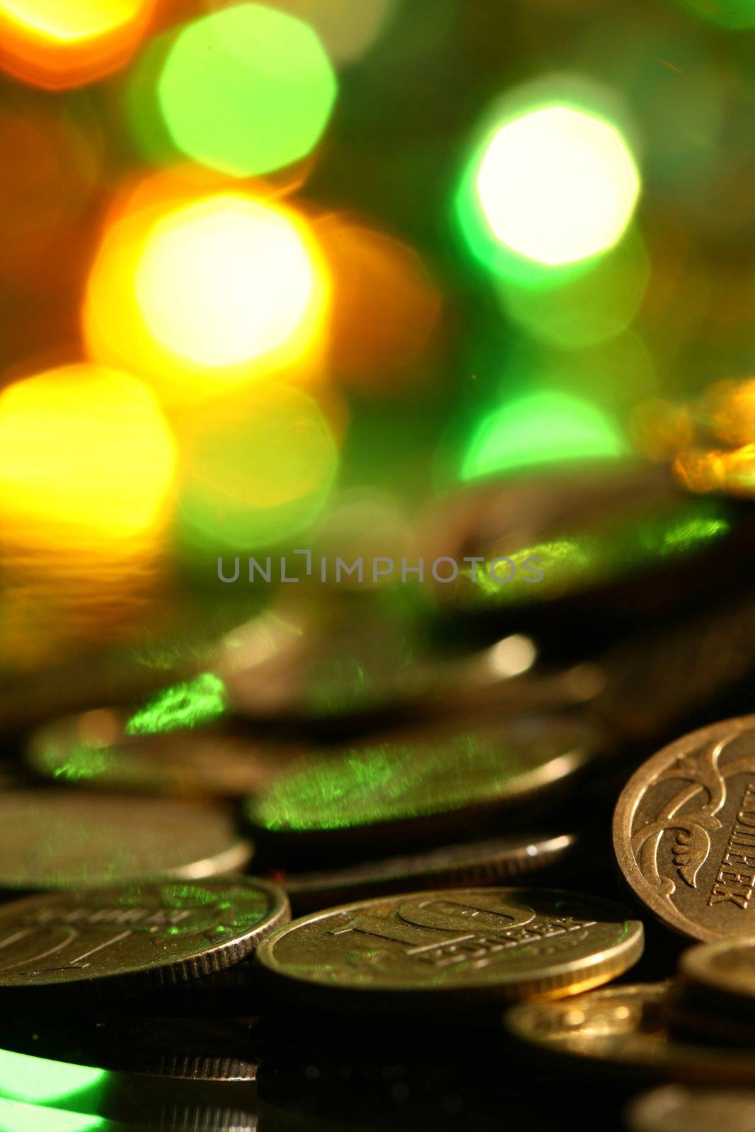 coins and colored  bokeh on background