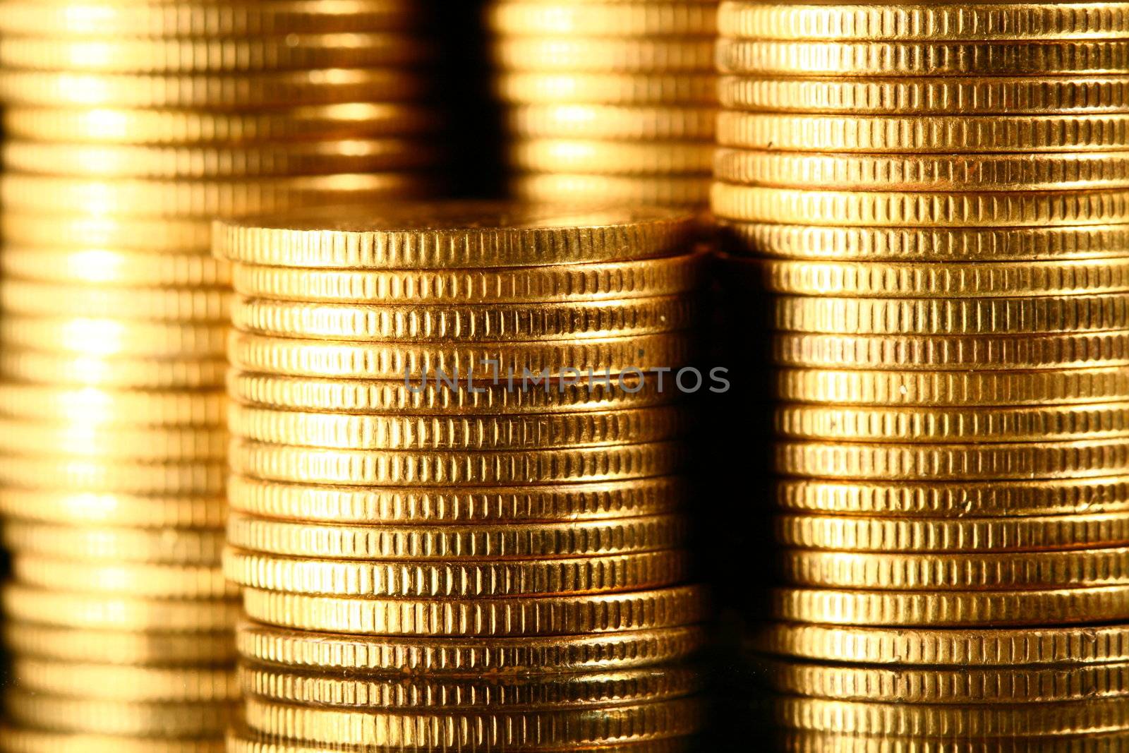 golden piles of coins macro background