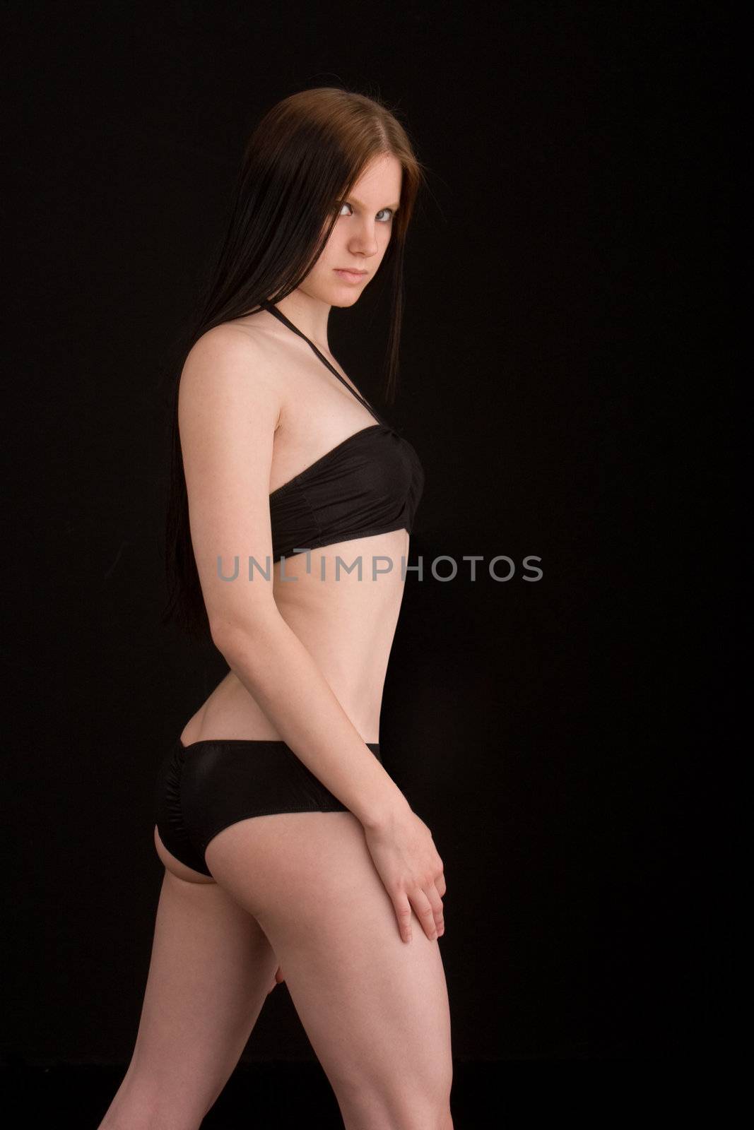 sexy girl in black bikini in black