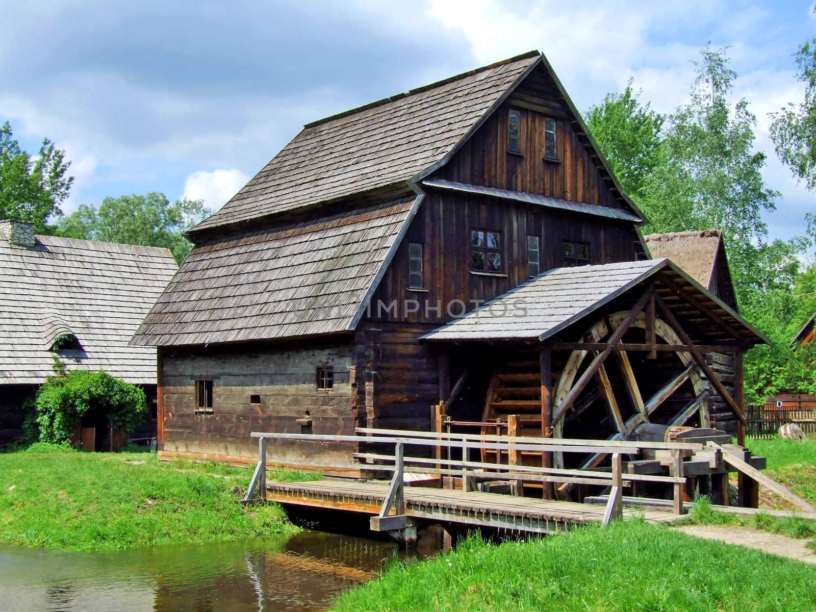 An old mill with water wheel in Poland