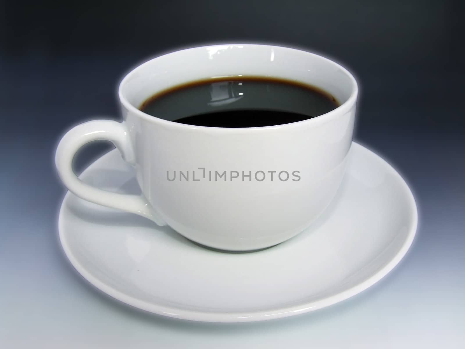 Black coffee in a white cup by anki21