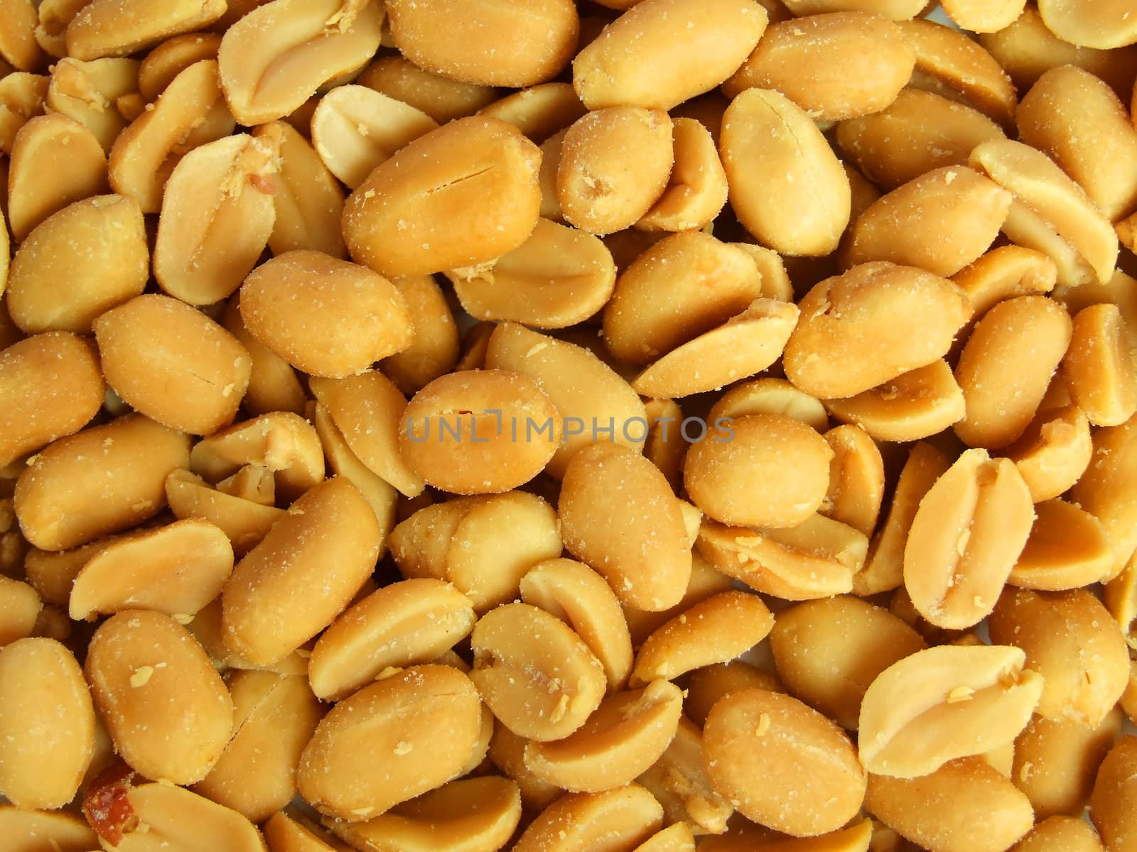 Close up shot of salted peanuts