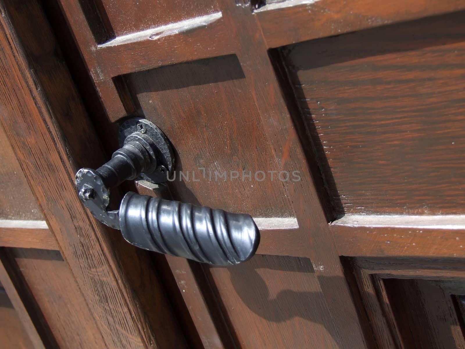 The closed arched doorway of a Church by anki21