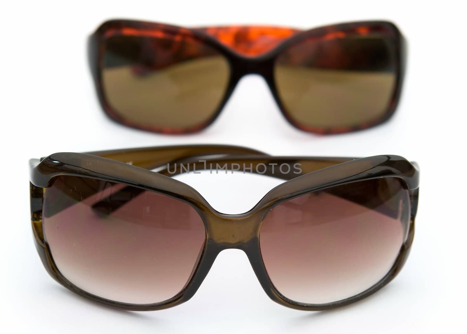 Sunshade. Sun glasses on a white background