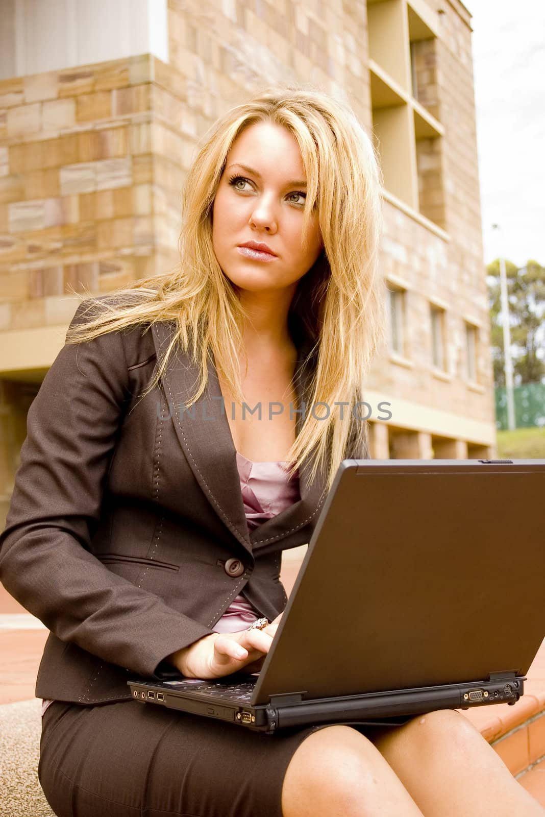 Young business student on a laptop