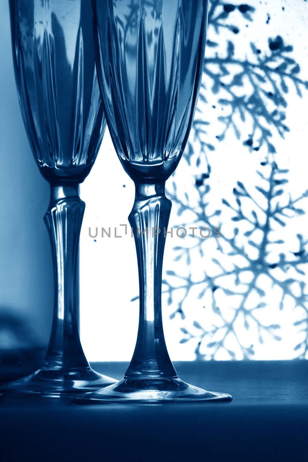 champagne in glasses on white background