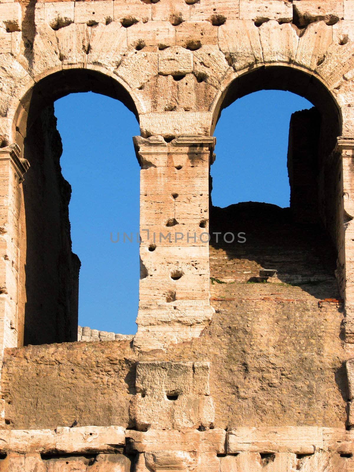 Arches in the Rome Coliseum by bellafotosolo