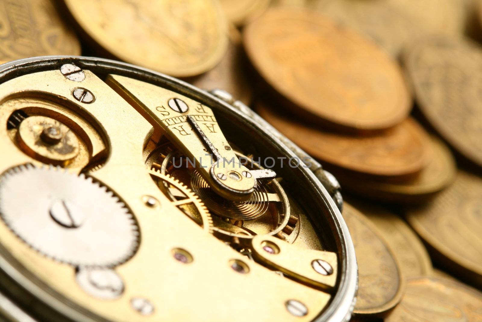 time is money coins and clock macro concet