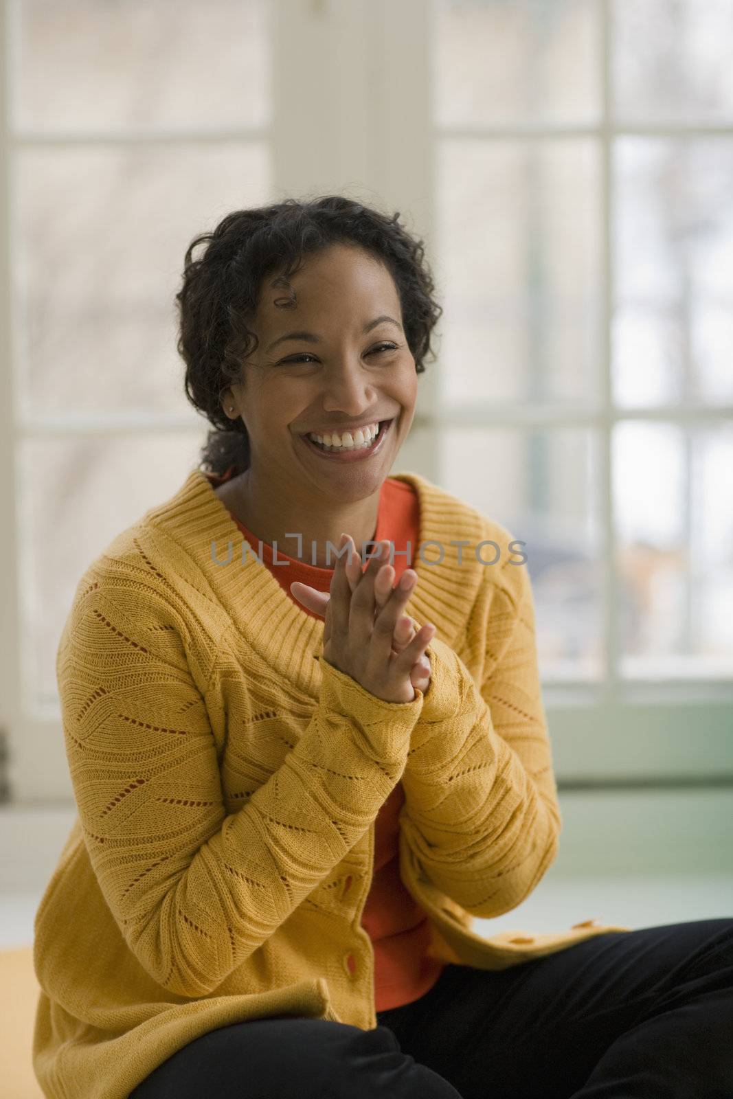 Beautiful smiling black woman  by edbockstock