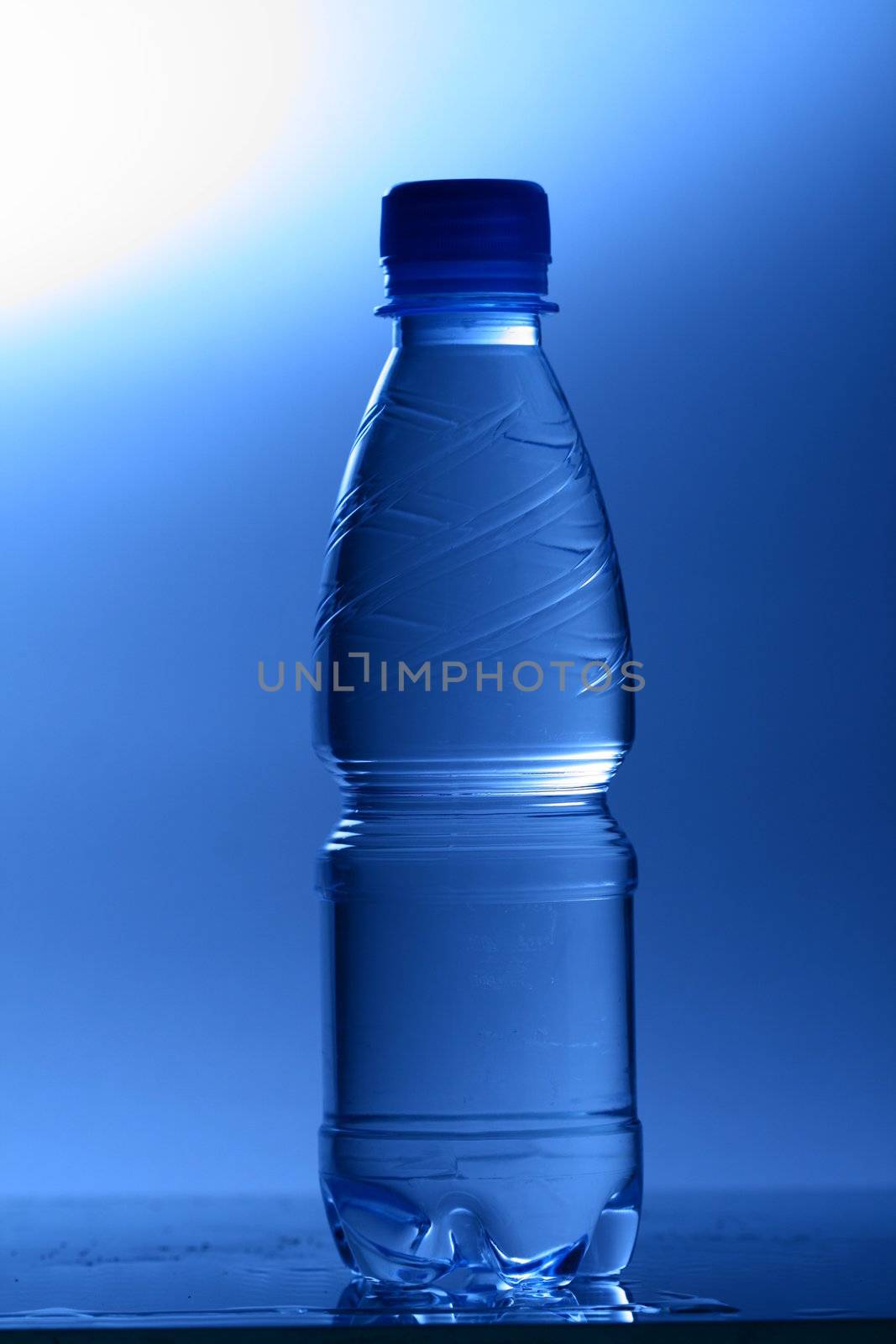 clear cold blue water in bottle