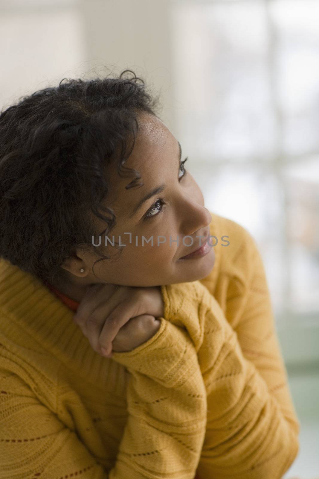 Portrait of a thoughtful beautiful young African American woman